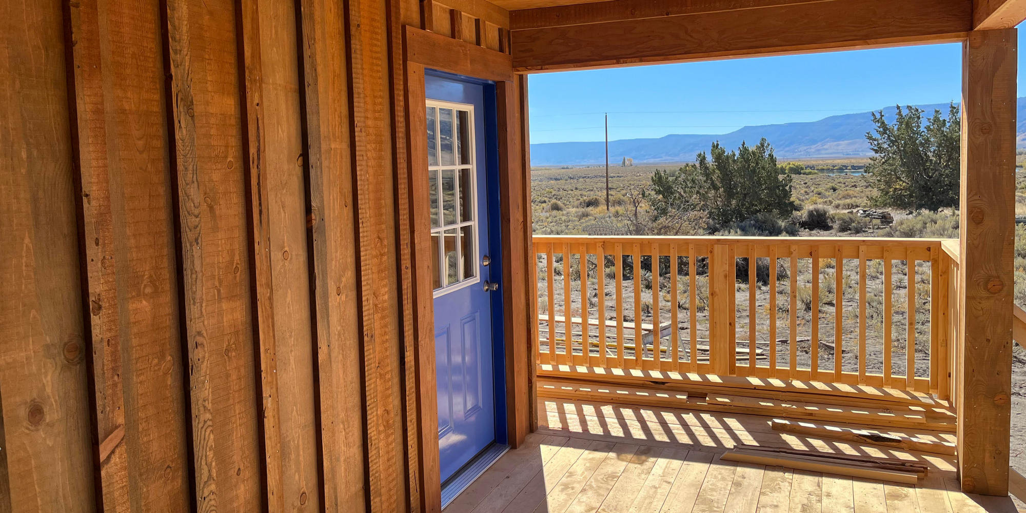 wood wall with blue door